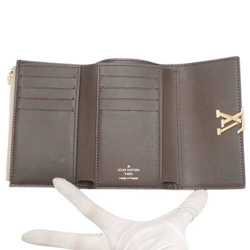 Portefeuille Capucines Compact Tri-fold Wallet in Taurillon Leather, Galle M62159 (Current as of December 2024)