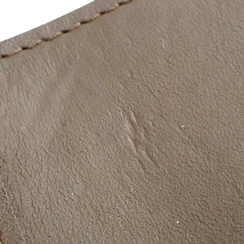 Portefeuille Capucines Compact Tri-fold Wallet in Taurillon Leather, Galle M62159 (Current as of December 2024)