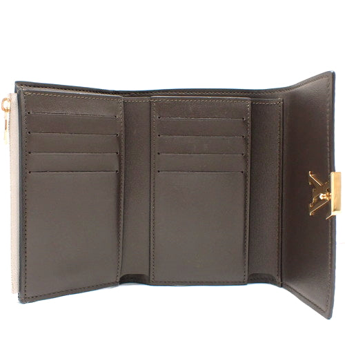 Portefeuille Capucines Compact Tri-fold Wallet in Taurillon Leather, Galle M62159 (current product as of December 2024)