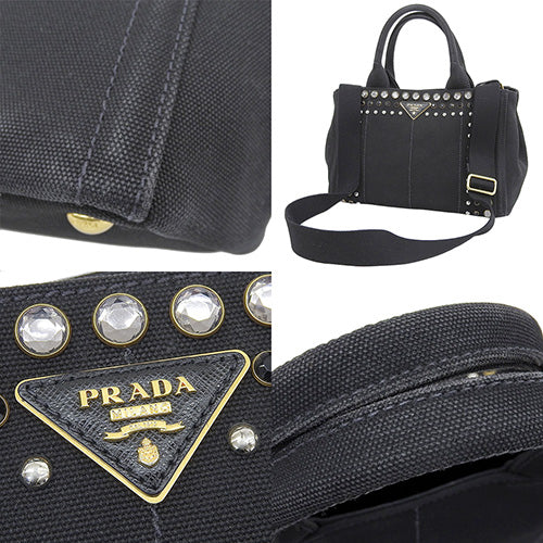 Fendi Canapa tote bag in canvas, Nero (black). 1BG439. Features jeweled studs and can be carried as a tote or shoulder bag.