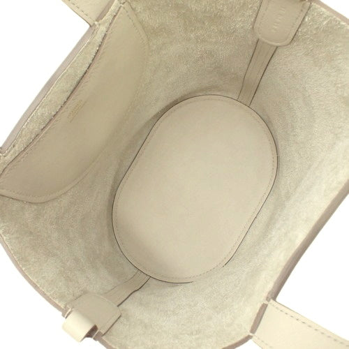 In the Loop 18, Trion Clemence, Cre, gold hardware, U stamp.