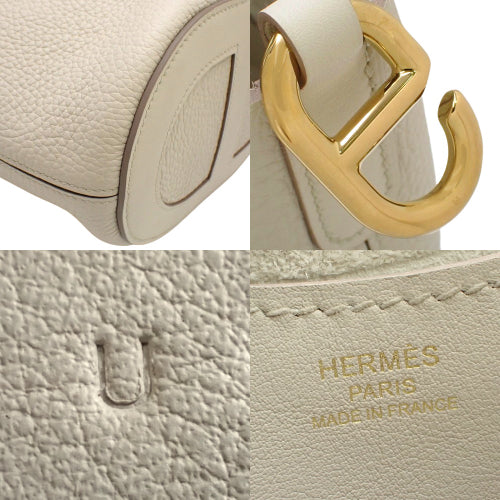 In the Loop 18, Trion Clemence, Cre, gold hardware, U stamp.
