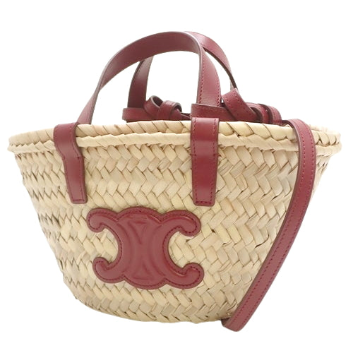 Triomphe Panier Mini Basket in Raffia and Leather, Bordeaux and Beige.  A woven basket bag, suitable for shoulder or hand carrying.