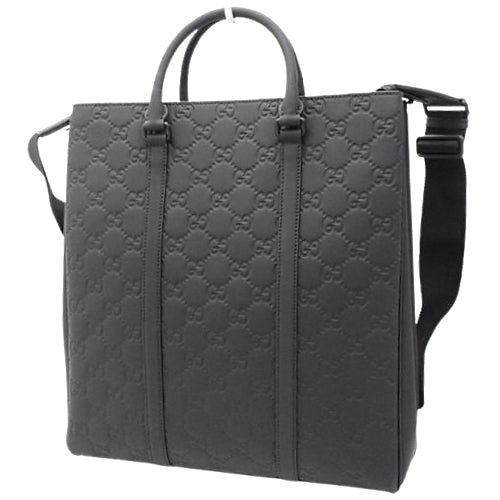 Double G 2-Way Bag, Rubber Effect Leather, Black, 771238. Can be carried as a shoulder bag or crossbody bag.