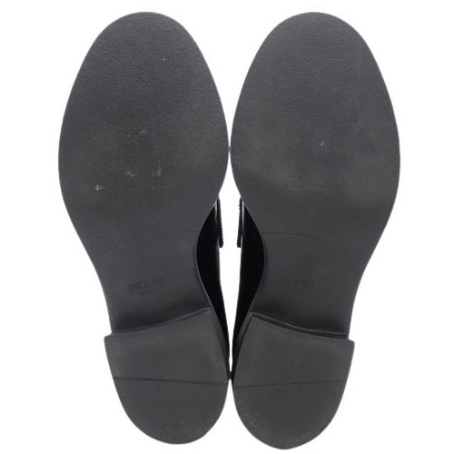 Chocolate brushed leather loafers, size 37, featuring a logo and cowhide leather accents. NERO color. 1D246M_ULS_F0002 (current as of December 2024).