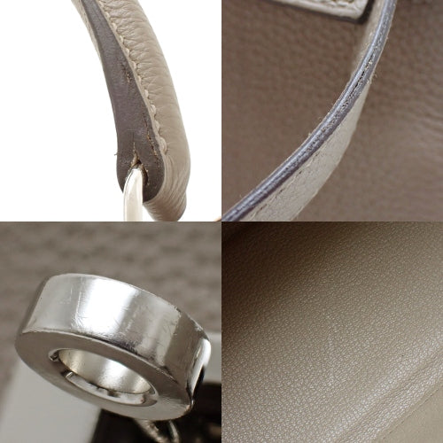 Kelly 28(内缝线)两用单肩包,Togo 皮革,镀钯金属配件,沥青饰面,C 字印章