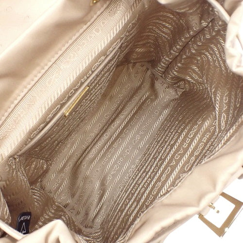Re-Nylon xオーストリッチ バックパック ショルダー ミニリュック オーストリッチ ナイロン カメオベージュ 1BZ074_2EX8_F0770_V_OOO(2025年2月現在現行品)