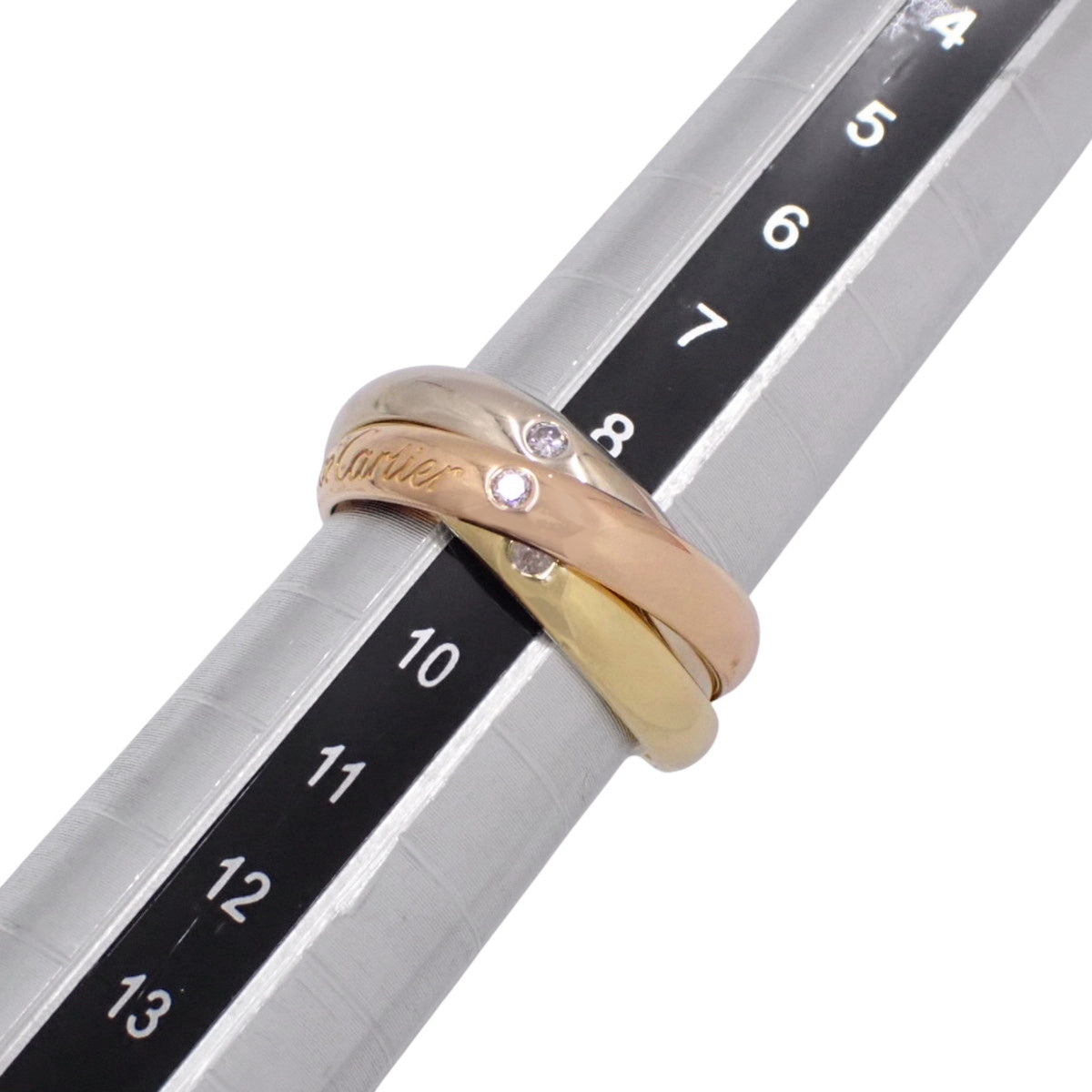 Cartier Trinity 钻石戒指,18K 黄金 (YG)、18K 白金 (WG) 和 18K 粉金 (PG)。