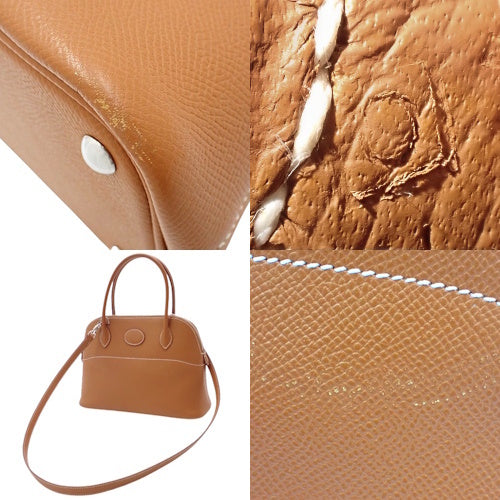 Bolide 27 Epsom leather with palladium hardware and gold accents.