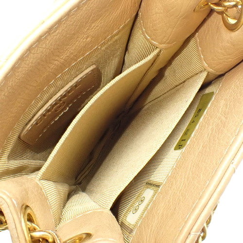 Matelasse Coco Mark Mini Chain Shoulder Bag in Lambskin