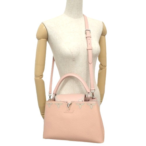 Capucines PM Taurillon 皮革铆钉单肩包 M51787