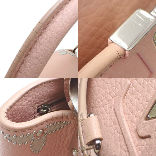 Capucines PM Taurillon 皮革铆钉单肩包 M51787