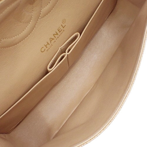 Matelasse Coco Mark Double Flap Chain Shoulder Bag in Caviar Skin