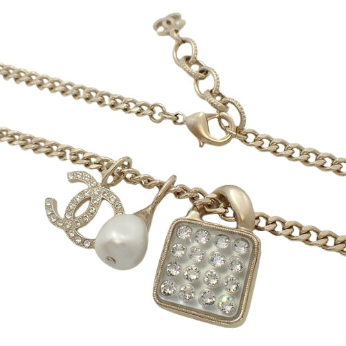 Coco Mark Rhinestone Long Necklace in Metal (GP) with Faux Pearls, Rhinestones, Padlock, and Cadena Motif