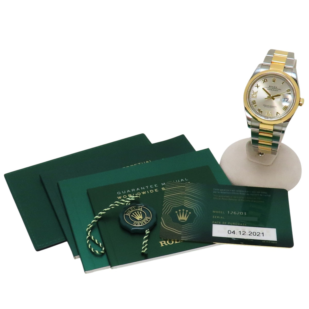 126203 Datejust 36 YG/SS, random serial number, automatic winding, silver dial with VI and IX diamond hour markers.