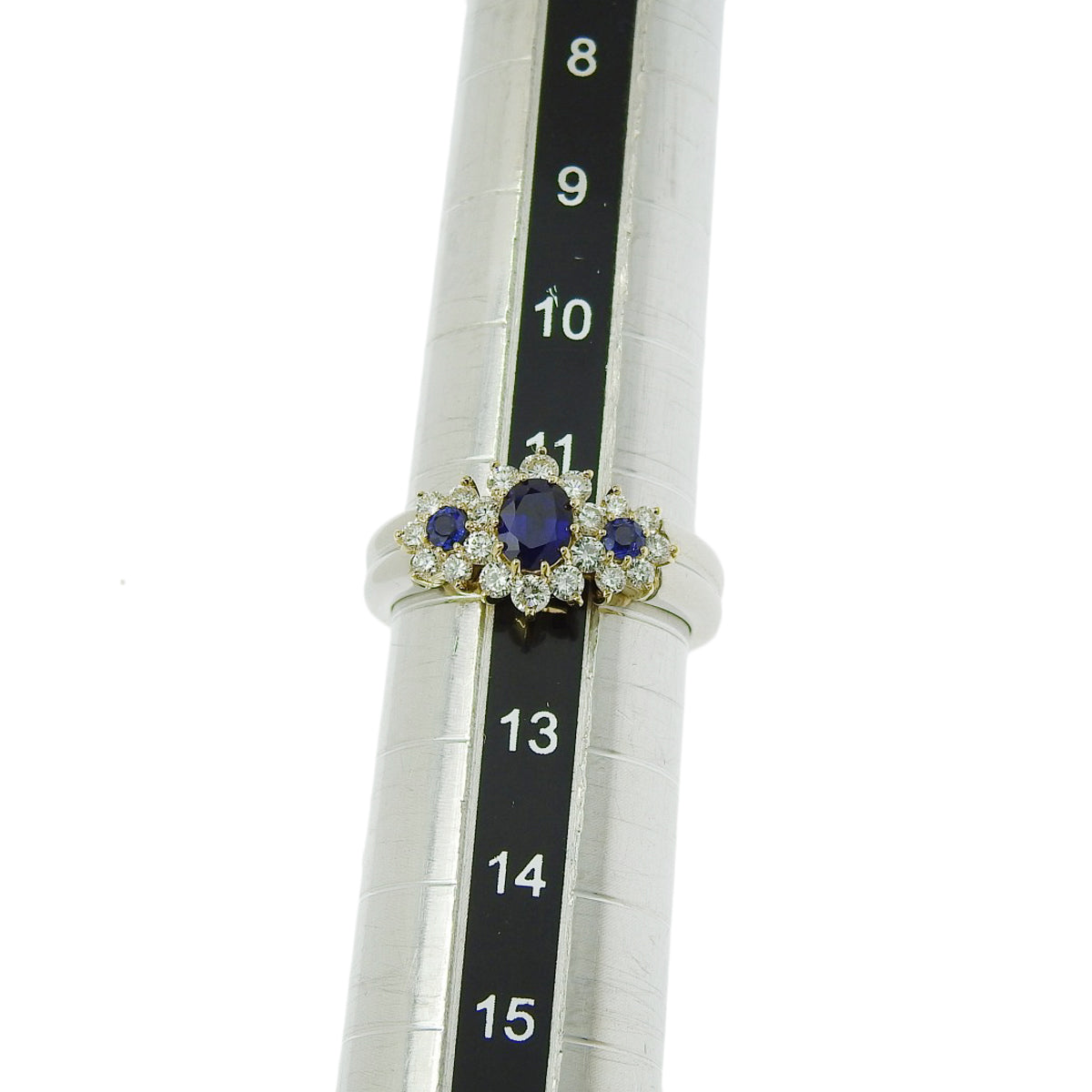 Sapphire and Diamond Ring: Sapphires 0.52ct, Diamonds 0.17ct/0.50ct, Platinum 900 (Pt900), 18k Yellow Gold (YG)
