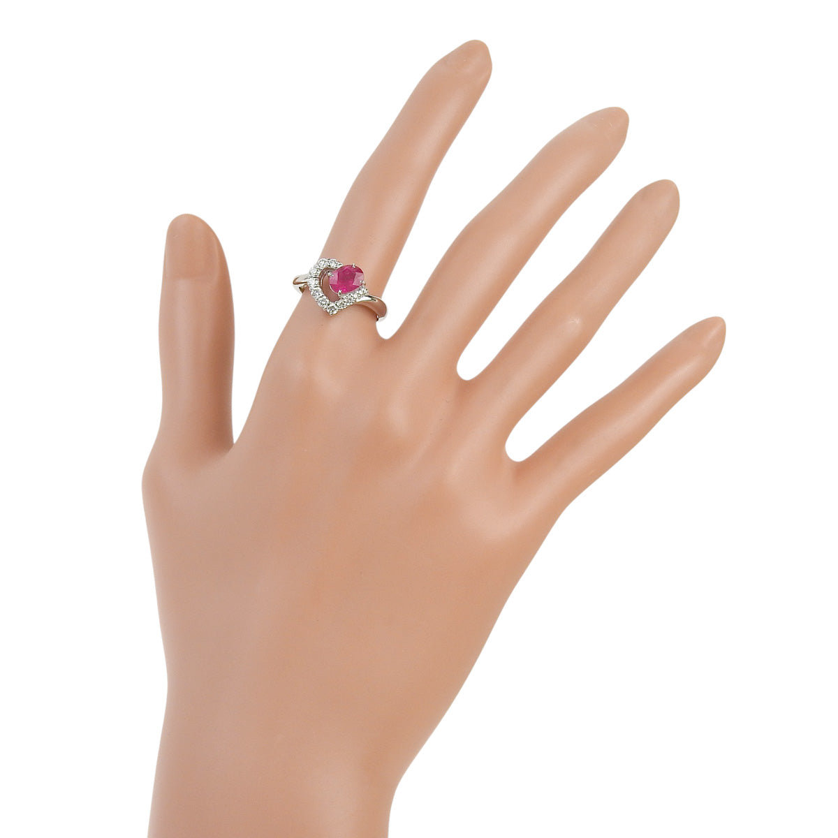Ruby and Diamond Ring: 1.22 carats of rubies, 0.35 carats of diamonds, 900 platinum.