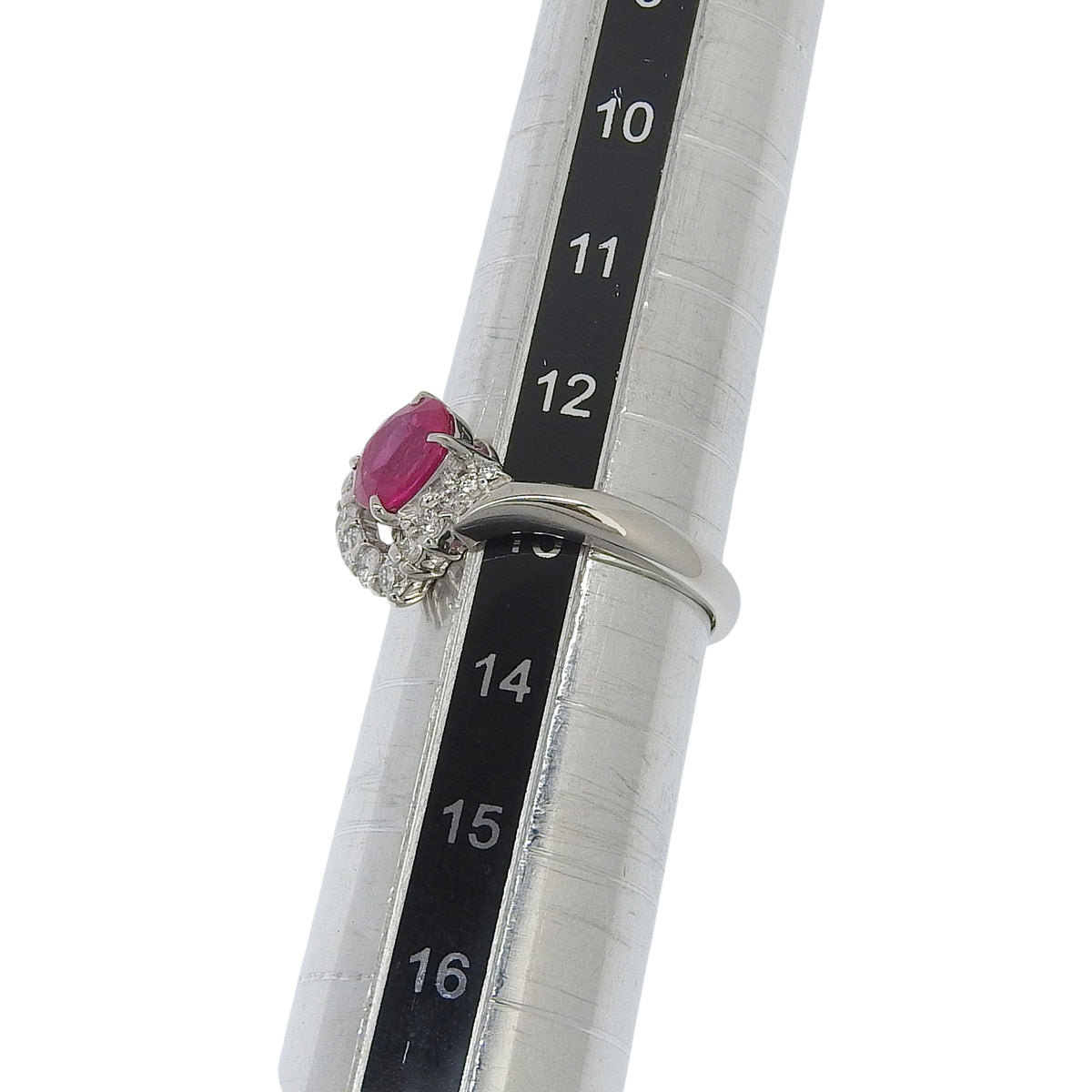 Ruby and Diamond Ring: 1.22 carats of rubies, 0.35 carats of diamonds, 900 platinum.