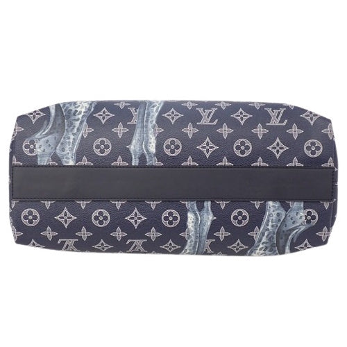 Chapman Brothers 皮革 Monogram Savannah 长颈鹿手提包,搭配 Monogram Savannah 帆布踝带设计 M54127