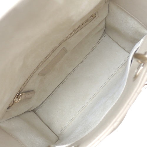 Lady Dior My ABCDior bag in small size, made of lambskin, beige color, model M0538ONGE_M63U. It's a 2-way bag, suitable for shoulder or crossbody carrying.