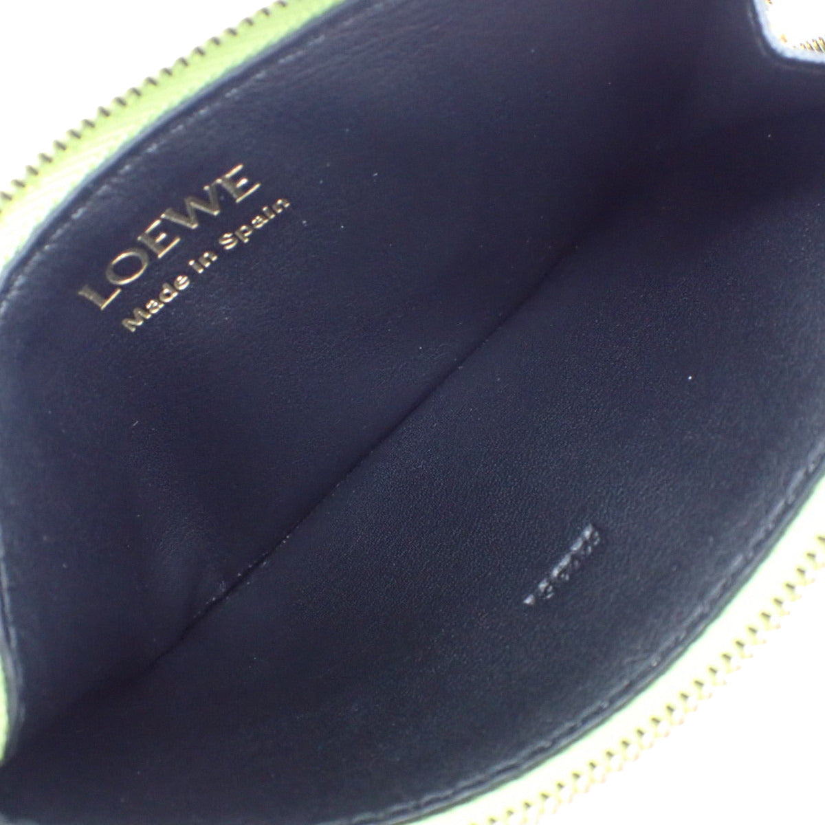 绿色和黑色皮革结扣零钱卡包