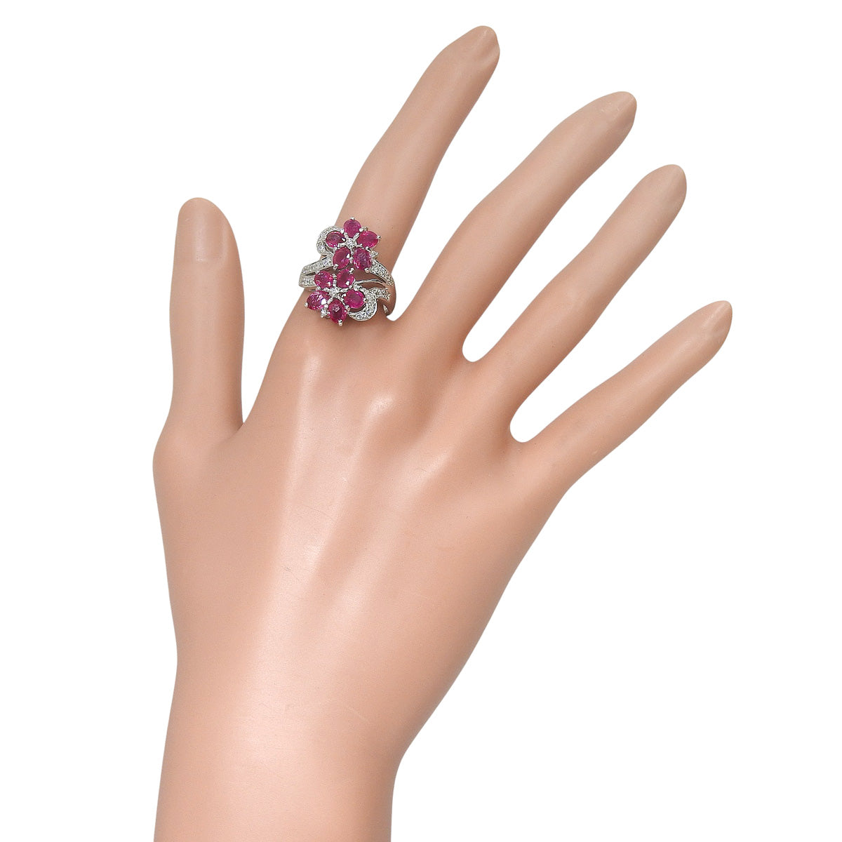 Flower motif ruby and diamond ring, 2.84 carats ruby / 0.28 carats diamond, 18K white gold.