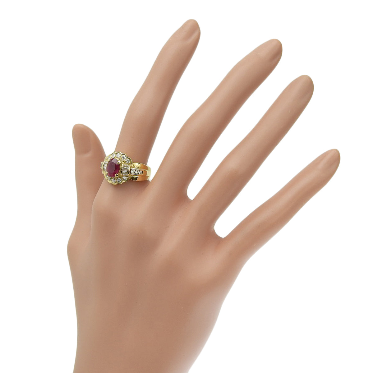 Ruby and Diamond Ring: 1.35 carats of rubies, 0.64 carats of diamonds, 18k yellow gold.