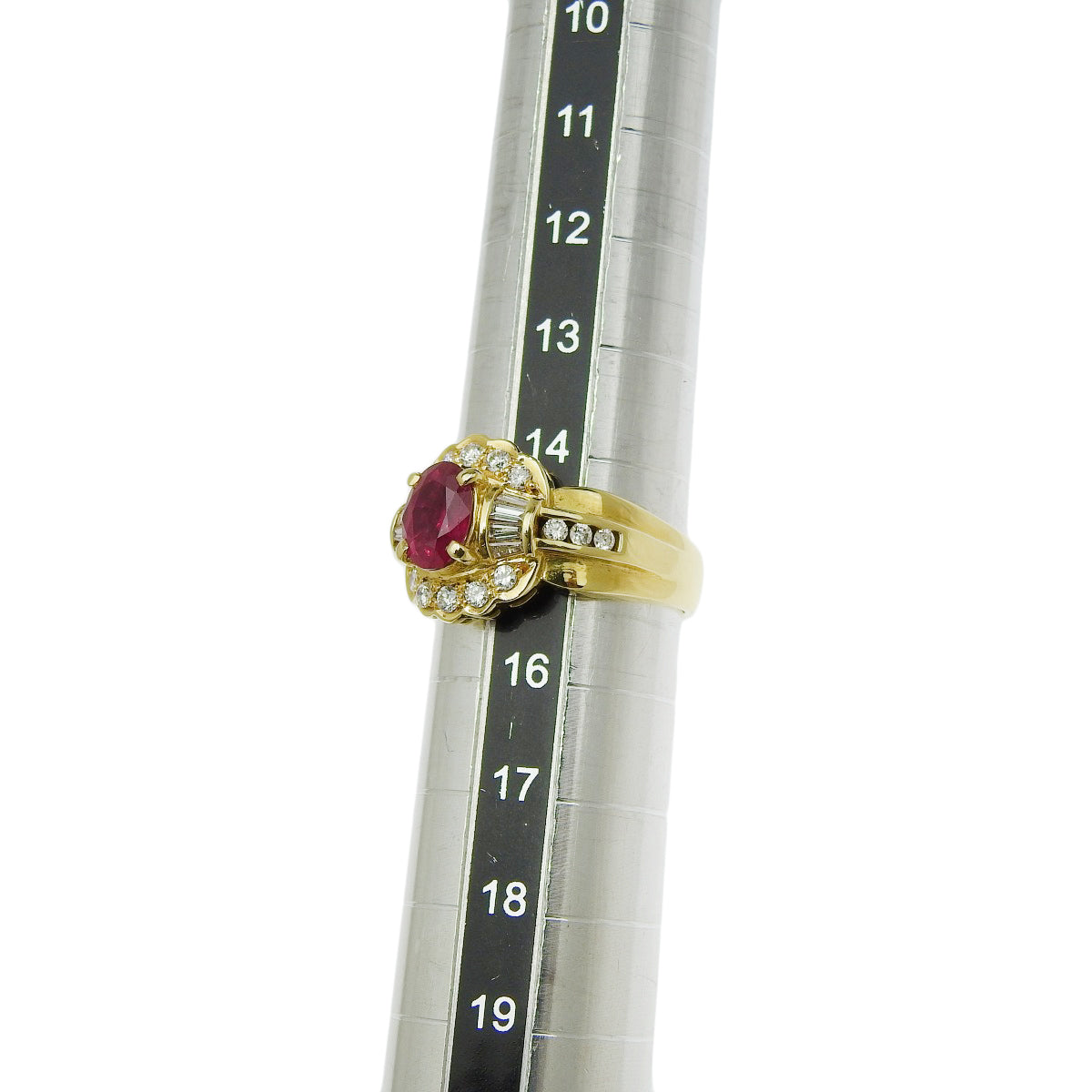 Ruby and Diamond Ring: 1.35 carats of rubies, 0.64 carats of diamonds, 18k yellow gold.