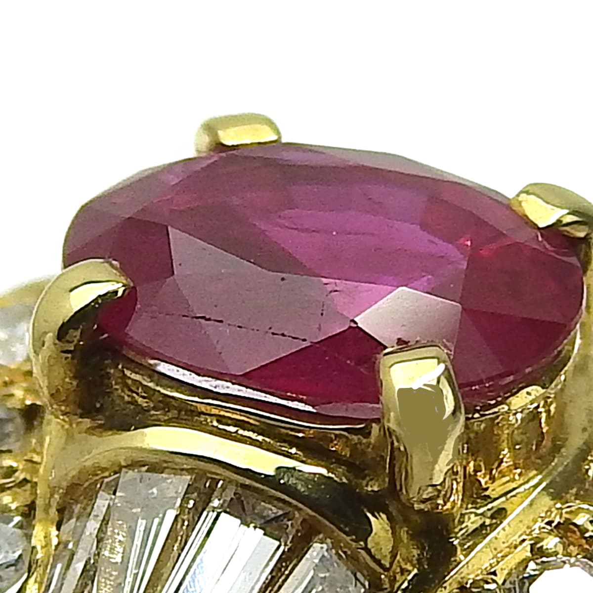 Ruby and Diamond Ring: 1.35 carats of rubies, 0.64 carats of diamonds, 18k yellow gold.