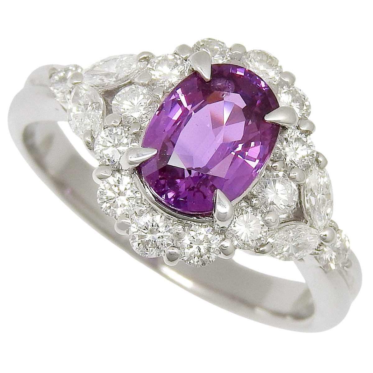 Pink Sapphire and Diamond Ring: 2.13 carats pink sapphire, 1.00 carats diamond, 900 platinum.