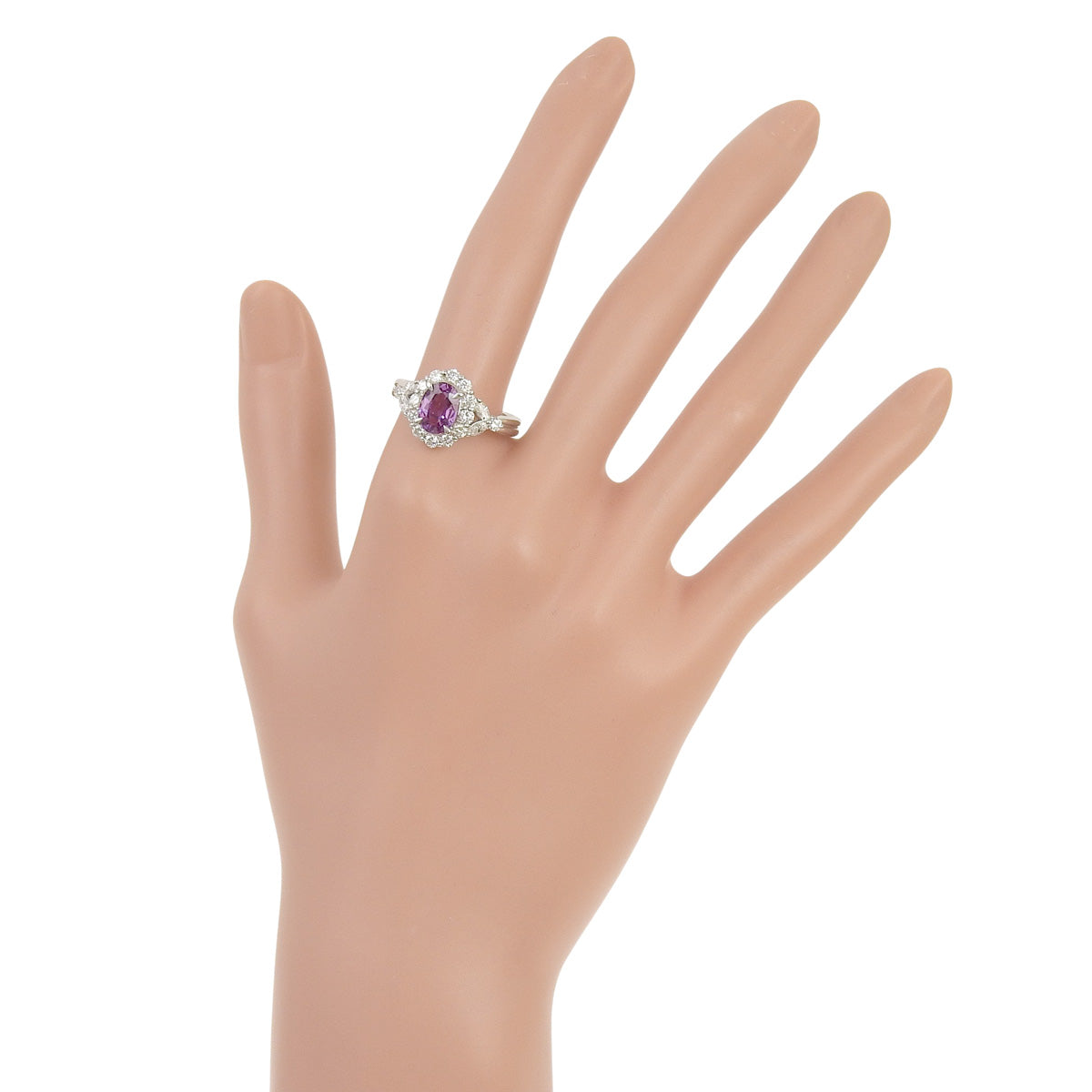 Pink Sapphire and Diamond Ring: 2.13 carats pink sapphire, 1.00 carats diamond, 900 platinum.
