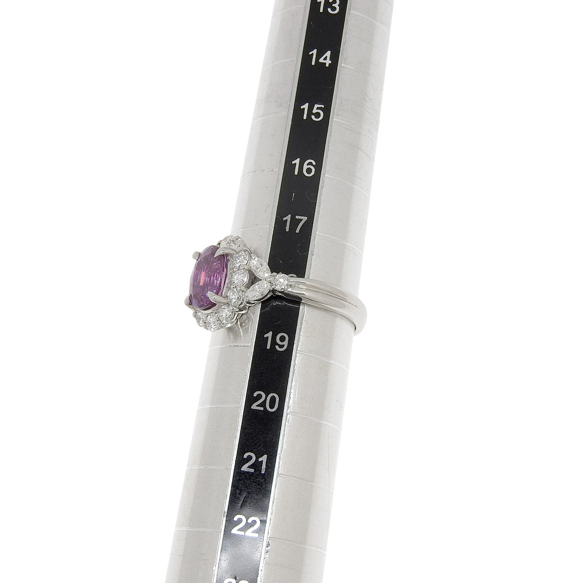 Pink Sapphire and Diamond Ring: 2.13 carats pink sapphire, 1.00 carats diamond, 900 platinum.