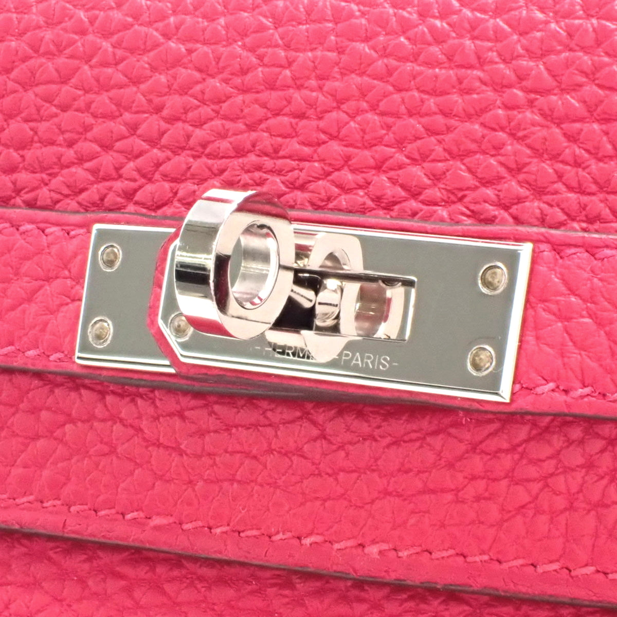Kelly 25 (inner-stitched) Togo leather, Framboise color, silver hardware, U stamp.