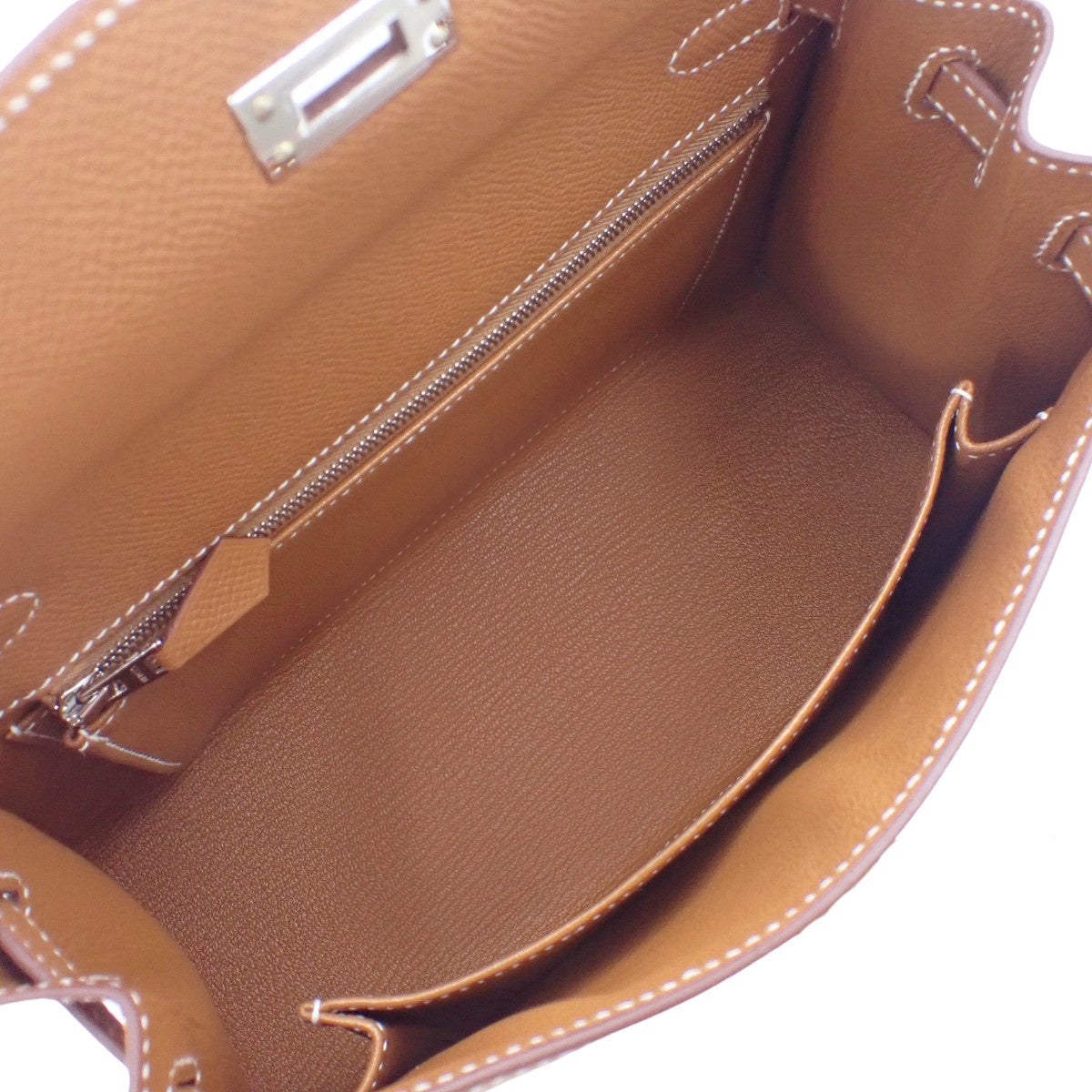 Kelly 25 (exterior stitching), Epsom calfskin, palladium hardware, gold or silver hardware, B stamp.
