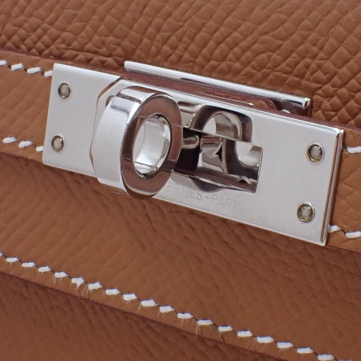 Kelly 25 (exterior stitching), Epsom calfskin, palladium hardware, gold or silver hardware, B stamp.