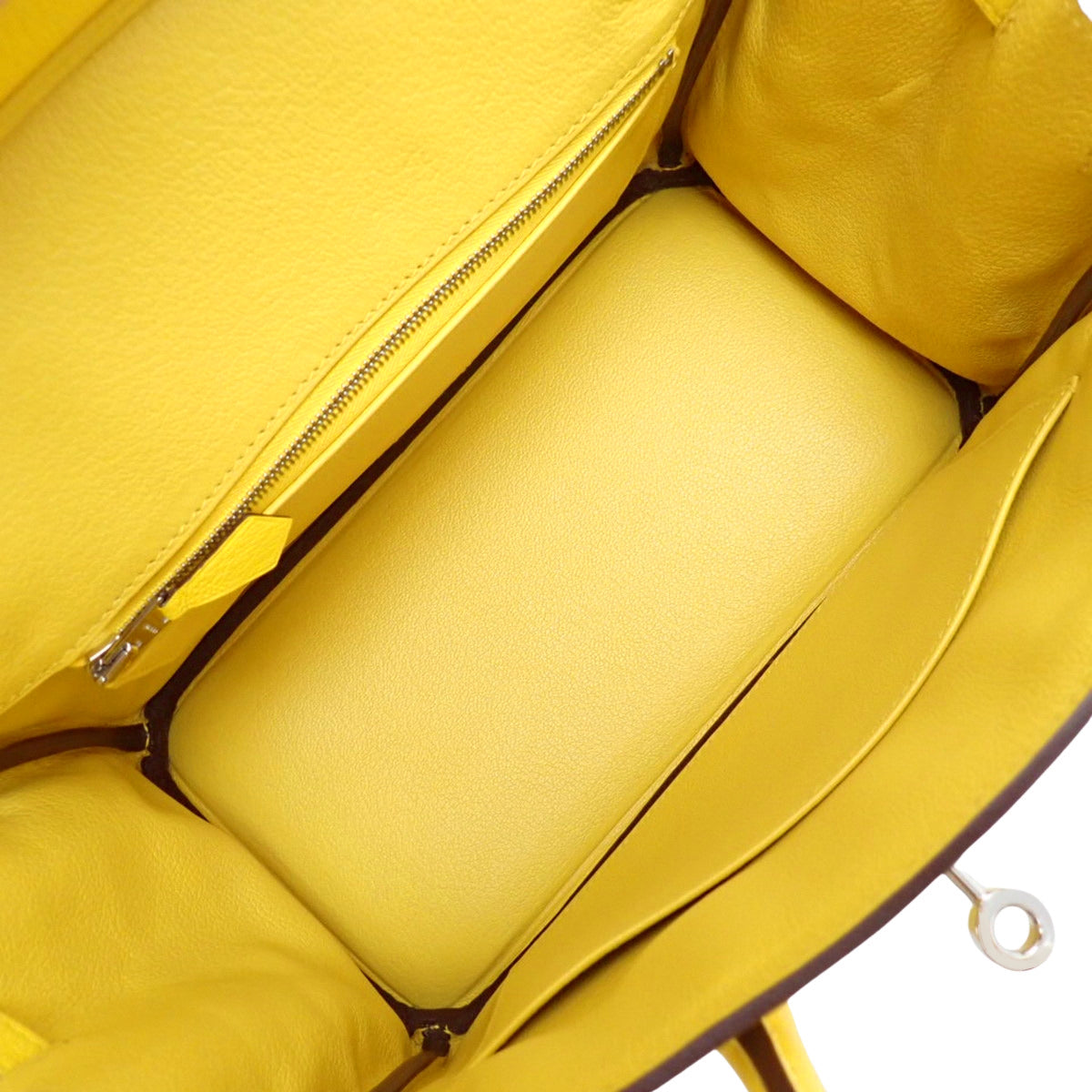 Birkin 25,采用 Taurillon Clemence Jaune-Naples 皮革,配银色五金件和 D 字印记。