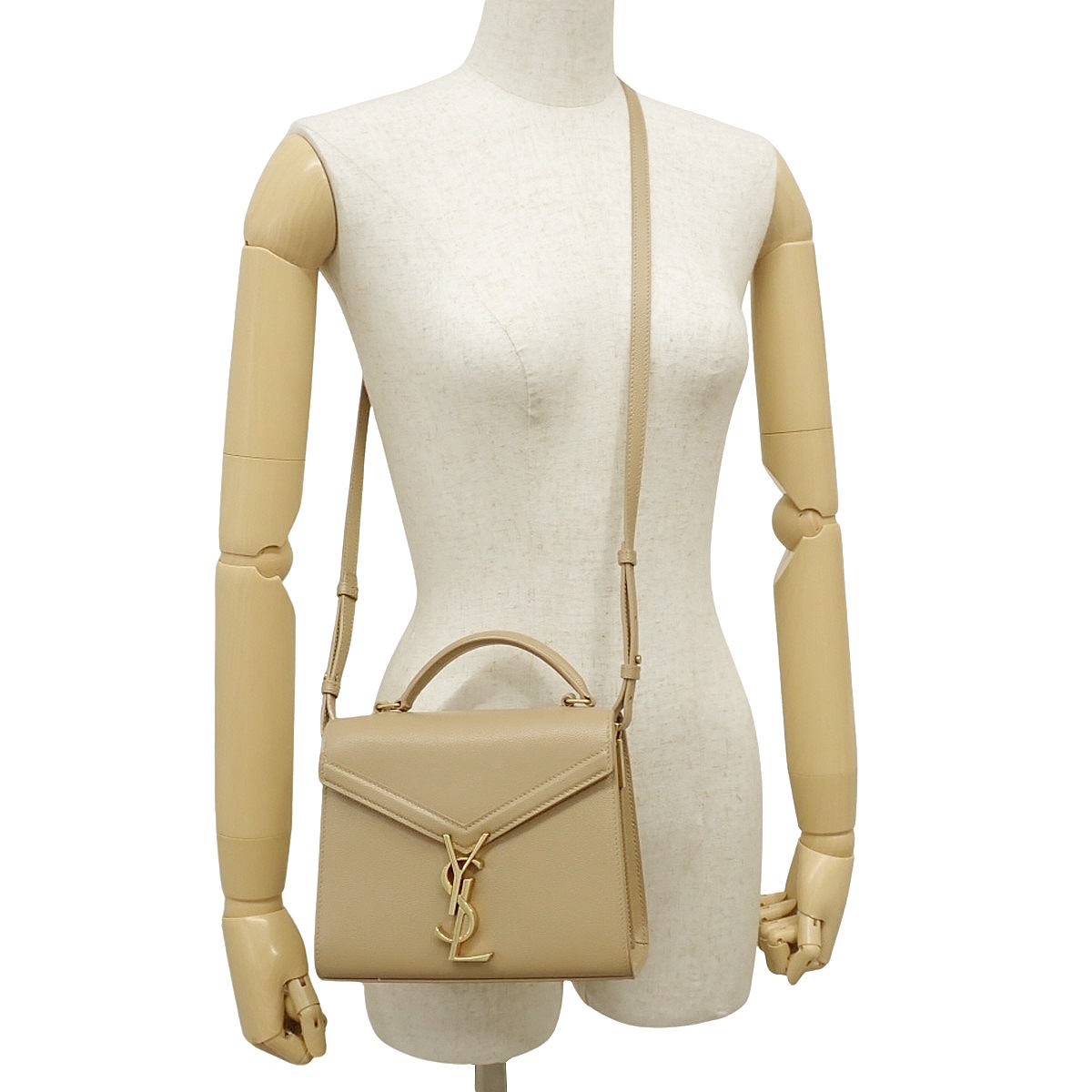 卡桑德拉迷你手提包 米色皮革 623931