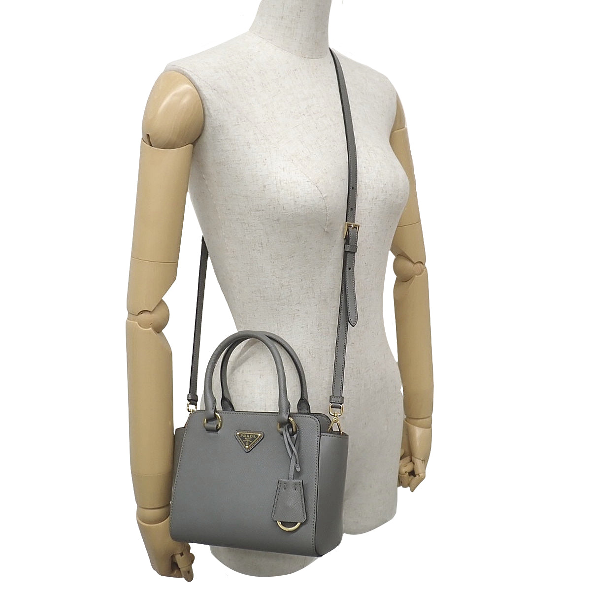 Mini bag in grey Saffiano leather 1BA380