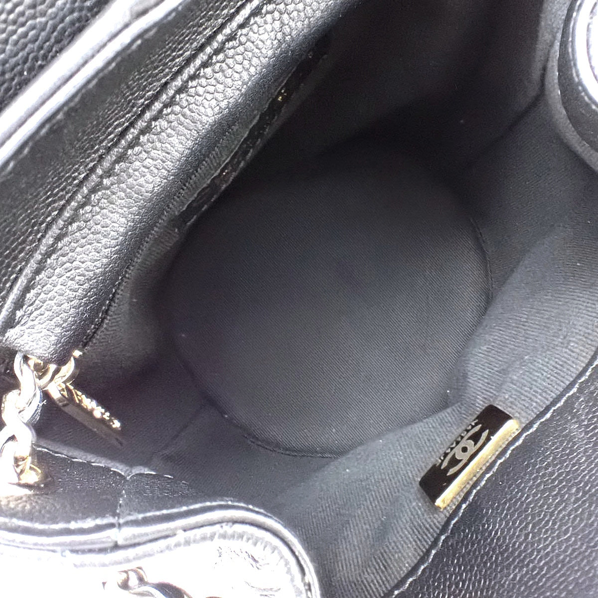 Matelasse Coco Mark Mini Backpack in Black Leather