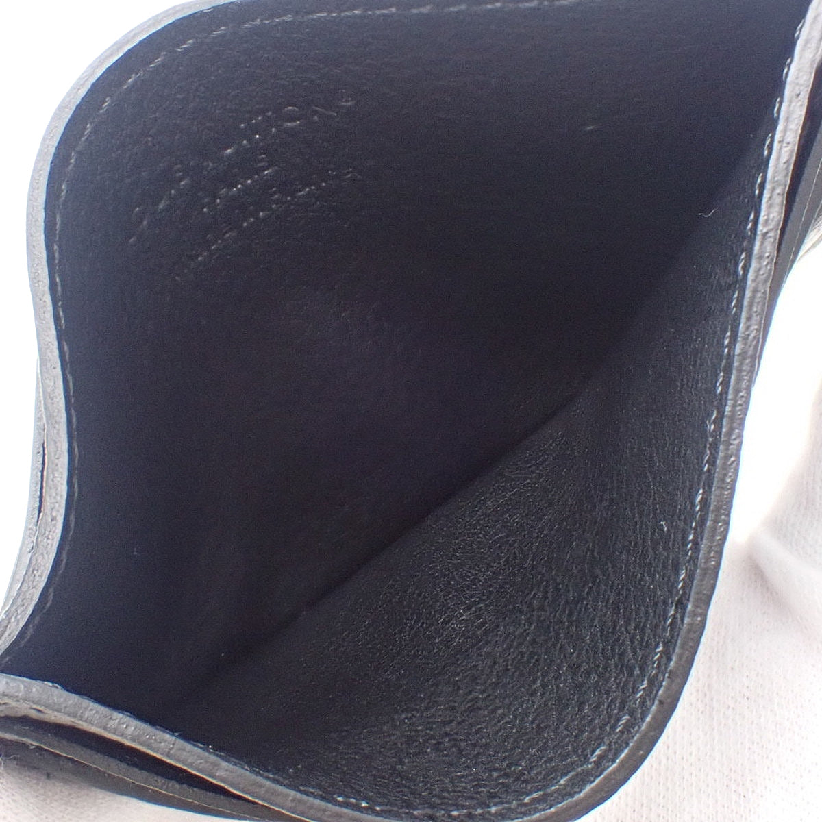 モノグラム・シャドウ ポルト・カルト・ダブル ノワール M81415