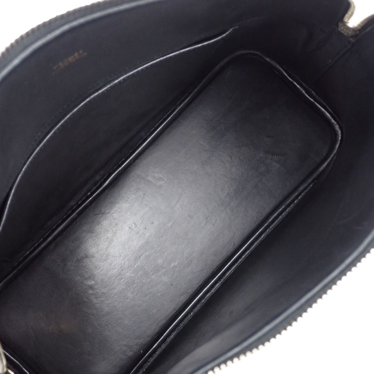 Bolide 31 in black box calf leather with gold hardware and an F stamp