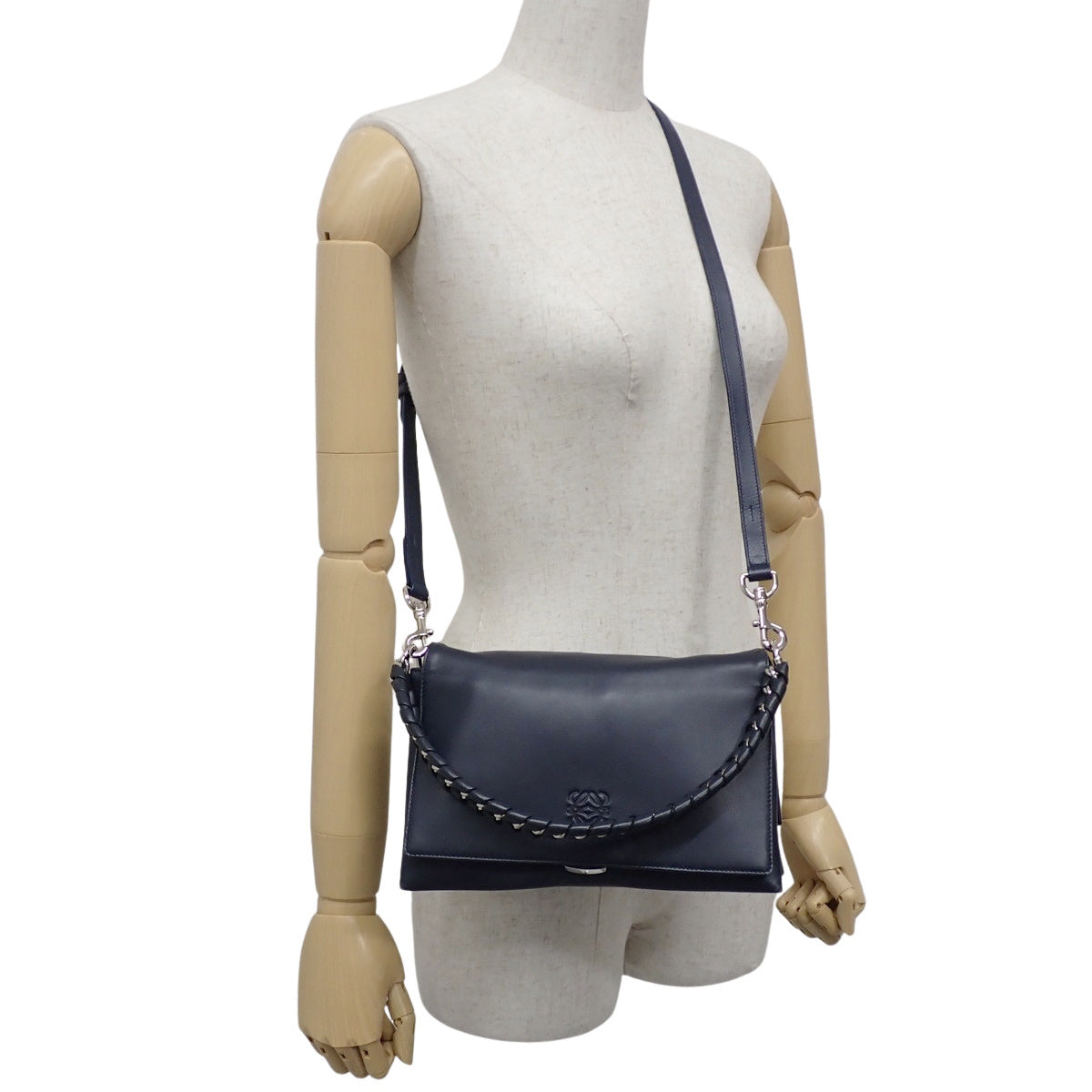 Anagram one-shoulder bag in navy sheepskin