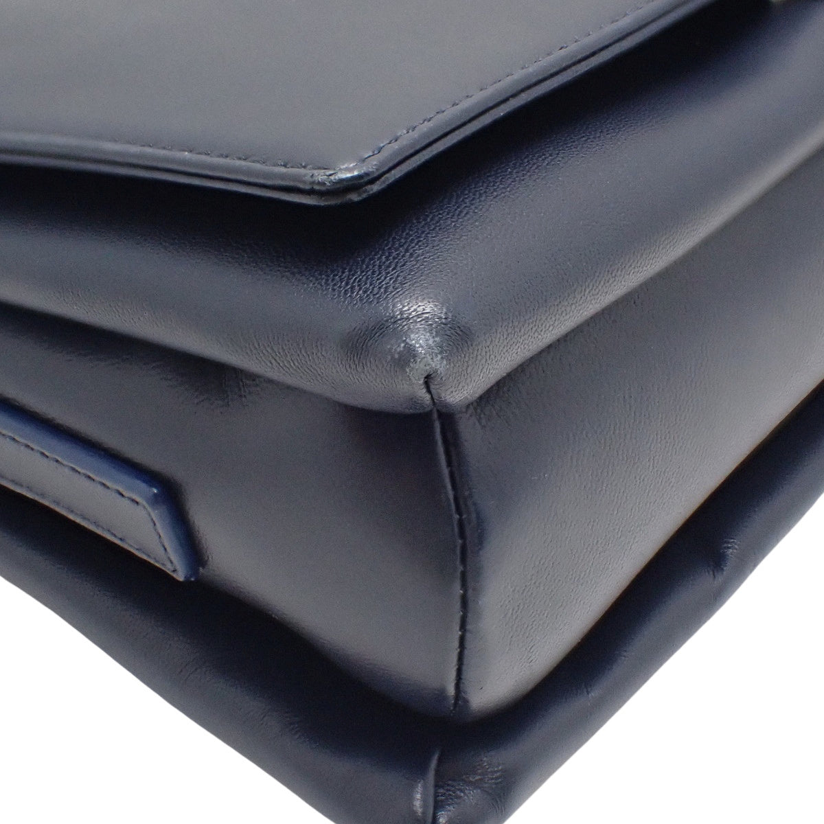 Anagram one-shoulder bag in navy sheepskin