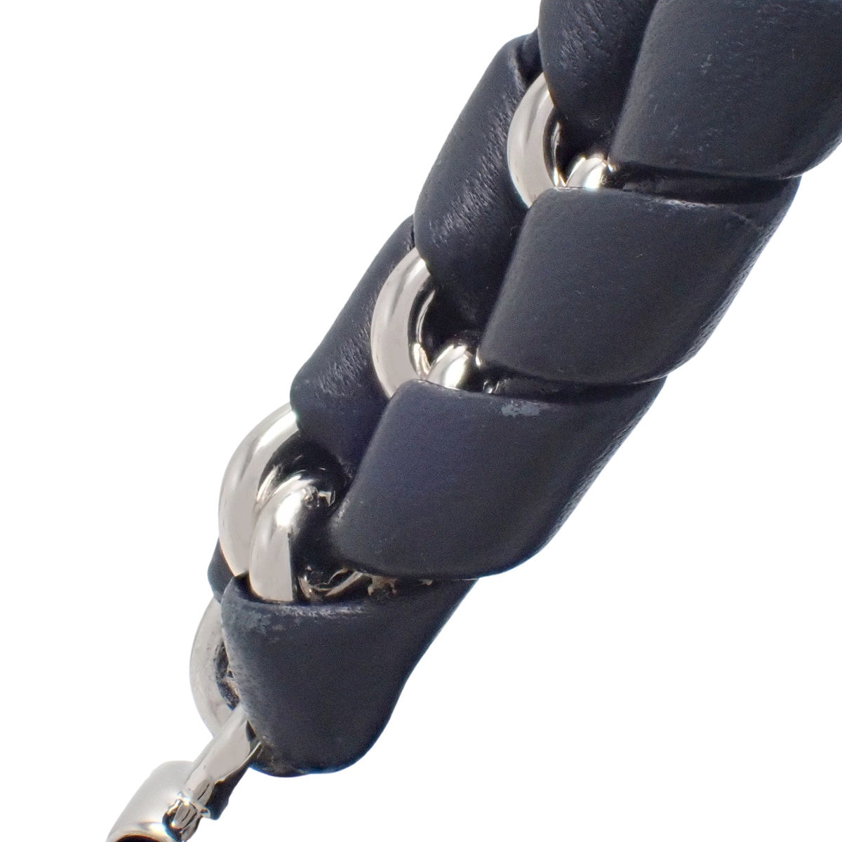 Anagram one-shoulder bag in navy sheepskin