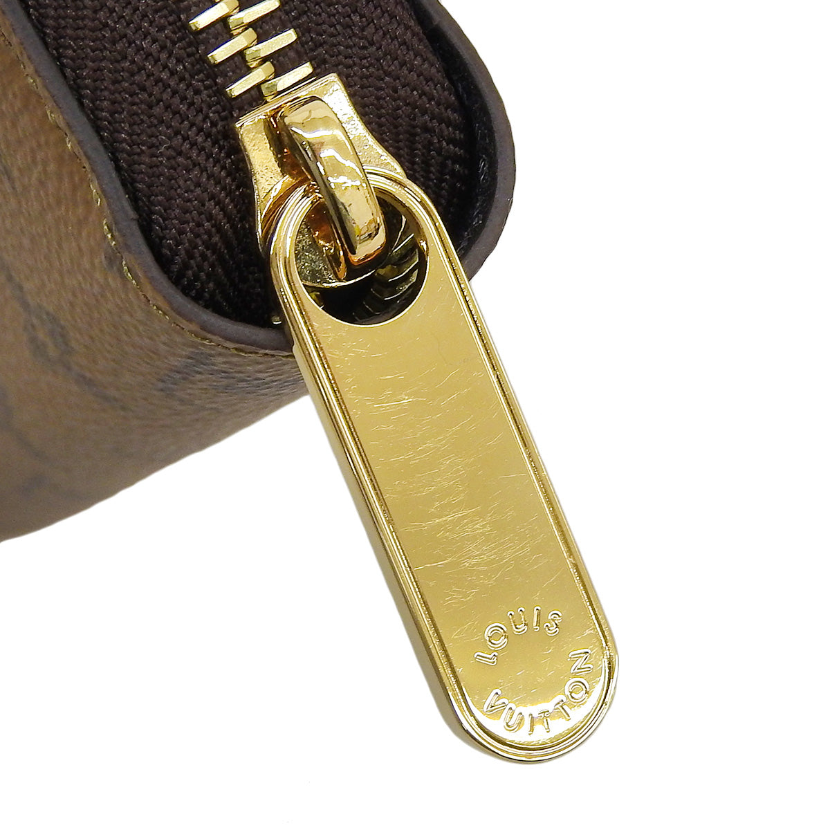 Monogram Reverse Zippy Wallet 棕色 M82444