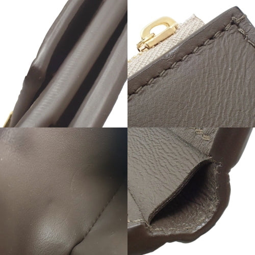 Portefeuille Capucines XS Tri-fold Wallet in Taurillon Leather, Galle M68747 (current product as of May 2024)
