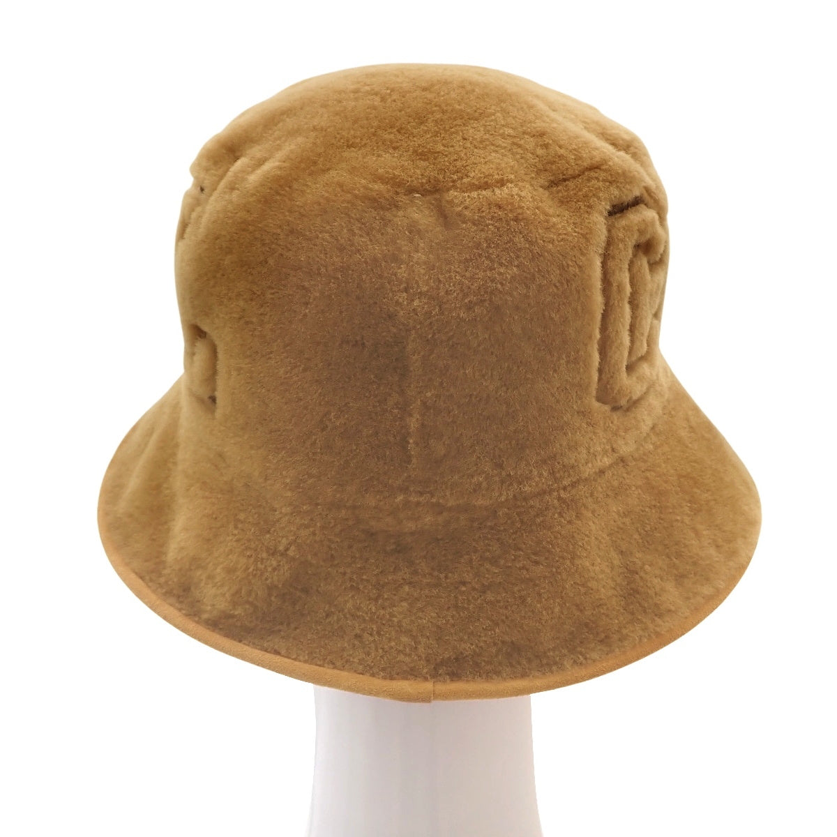 Coconage reversible bucket hat in fur, suede/suede, and mouton, 24N stamped.