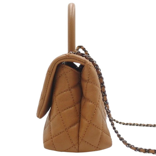 Matelasse Coco Mark Chain Shoulder Bag in Caviar Skin