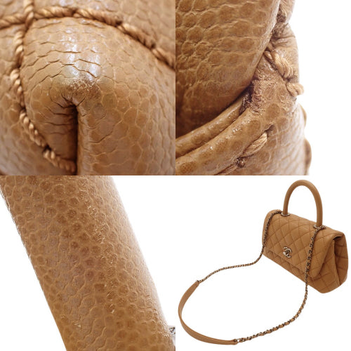 Matelasse Coco Mark Chain Shoulder Bag in Caviar Skin