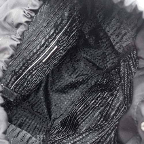 Re-Nylon バックパック ナイロン サフィアーノレザー ブラック 1BZ039_RV44_F0002 肩掛け ショルダー リュックサック